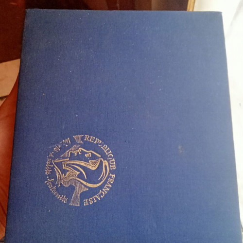 Stamp album with some stamps, mostly cancelled