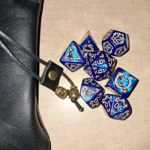 Black leather dice bag with blue dragon D&D dice set