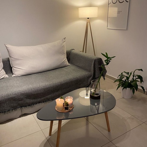 Coffee table new gray with glossy lacquer surface and solid legs