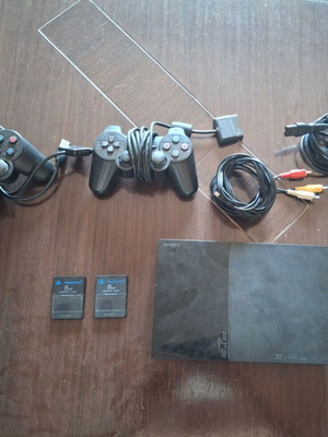 Sony PlayStation 2 Slim SCPH-90004 console bundle with 2 controllers and 2 memory cards