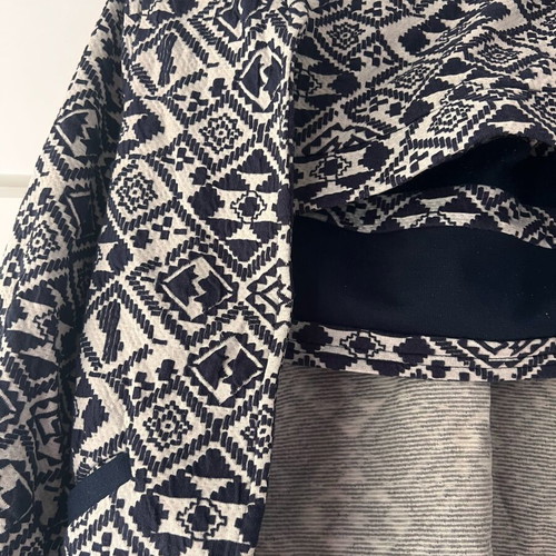 Only women's set with patterned cardigan and skirt, used
