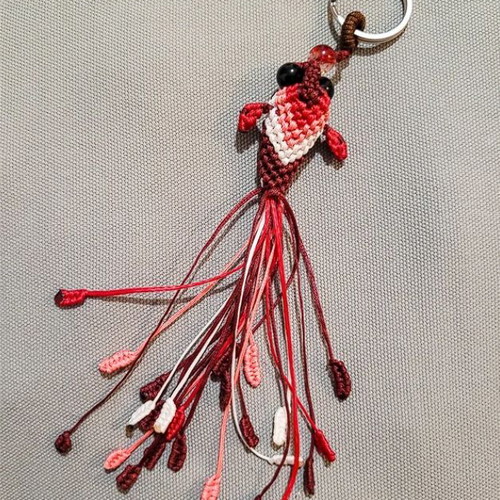 Macrame koi fish keychain like new, red and pink