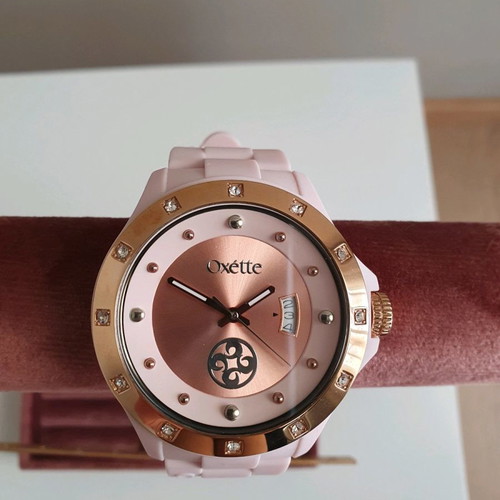 Oxette pink women's watch with rubber strap and pink gold dial like new