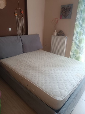 Double bed with lifting mechanism and storage, like new, with mattress