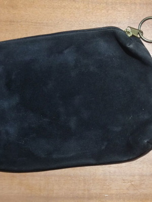 Velvet black handbag used with zipper and metal ring