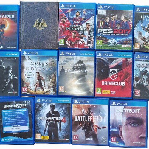 Sony PlayStation 4 Slim 1TB console used with 2 DualShock controllers and 14 games