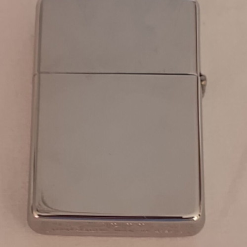 Zippo Colossus of Rhodes lighter used, laser engraved, made in USA