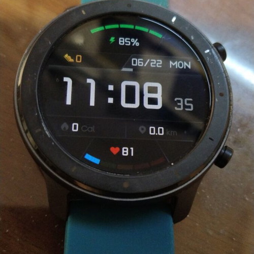 Amazfit GTR smartwatch with removable 22mm strap and charging cable