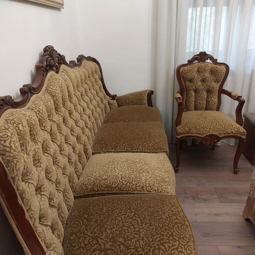 Antique carved wood sofa and armchair set