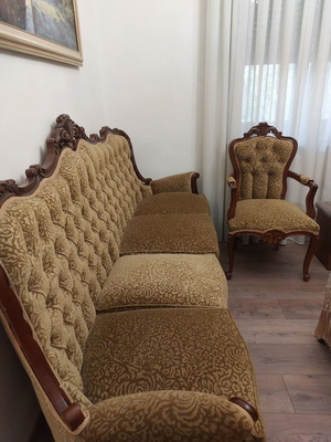 Antique carved wood sofa and armchair set