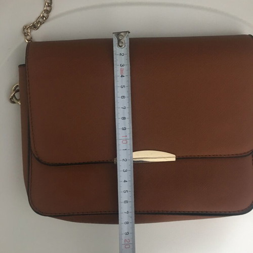 Small tan crossbody bag lightly used