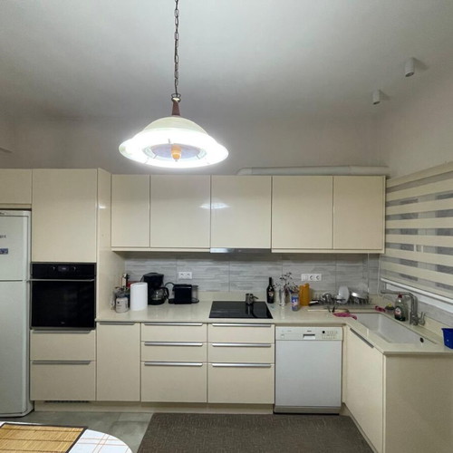 Modern kitchen with quartz countertop and granite undermount sink like new, beige lacquer