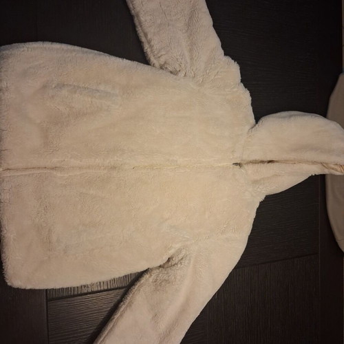 Reversible fur jacket with hood and pockets