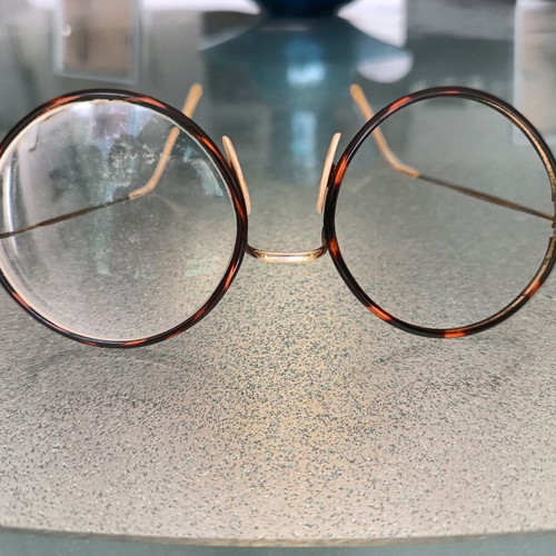 Eyeglasses used, very lightweight, gold color