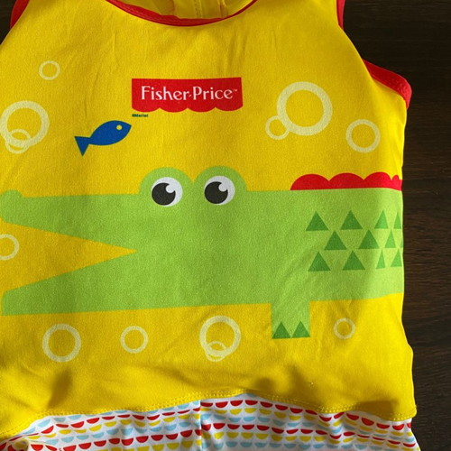 Fisher-Price children's swim vest and blocks used with free swim diapers