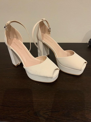 High heels used, white sandals, size 37