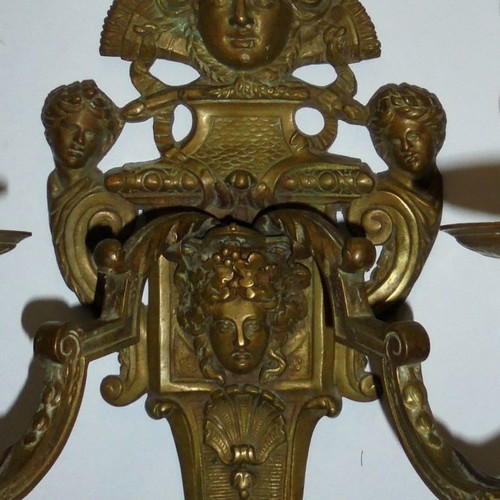 Pair of bronze antique two-light wall sconces, late 19th century