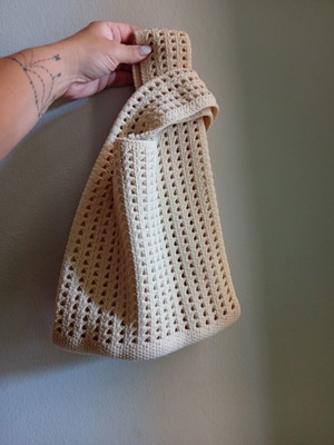 Knitted handbag new, beige, hand type