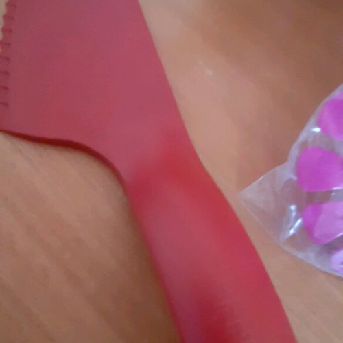 Tupperware product set new with collectible spatula and small cups