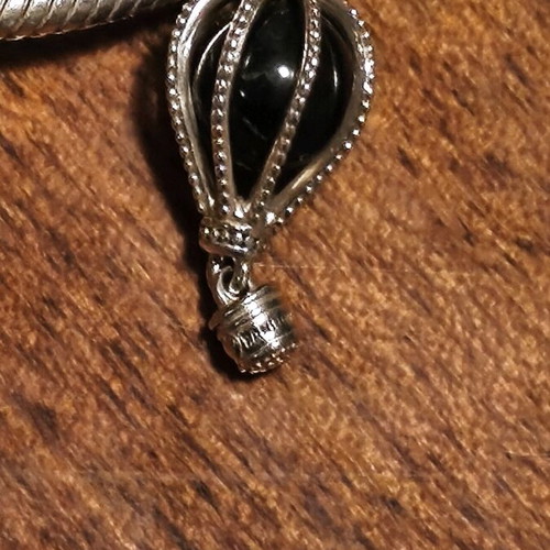 Pandora bracelet authentic used size 16 with 6 charms and safety chain