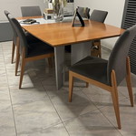 Solid wood dining table designed by Eleni Natsi