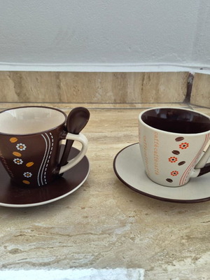 Cups with saucers and spoons used, set of 2 pieces