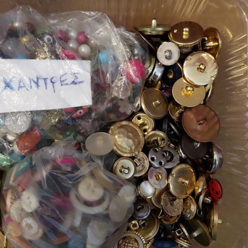 Collection of small and large buttons, beads and iron buttons