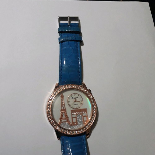 Women's wristwatch with rhinestones and blue straps used