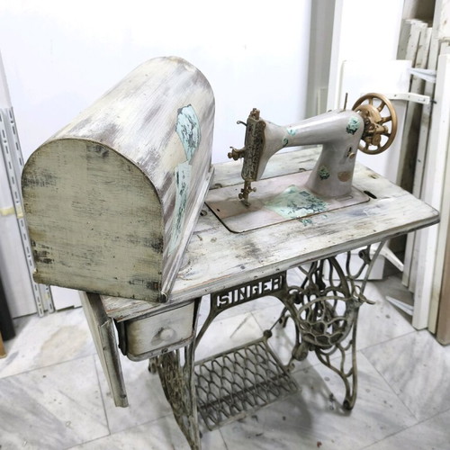 Singer sewing machine decorated with decoupage and aging, used
