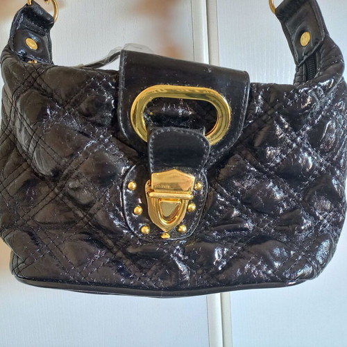 Black shoulder bag new with gold details