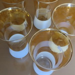 Vintage glass set of 5 with amber glass and white satin base like new
