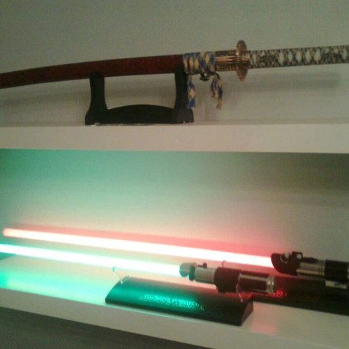 Yoda Lightsaber collectible used by Master Replicas Force FX