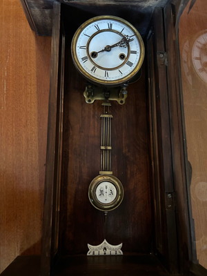 Wood-carved pendulum wall clock used, analog