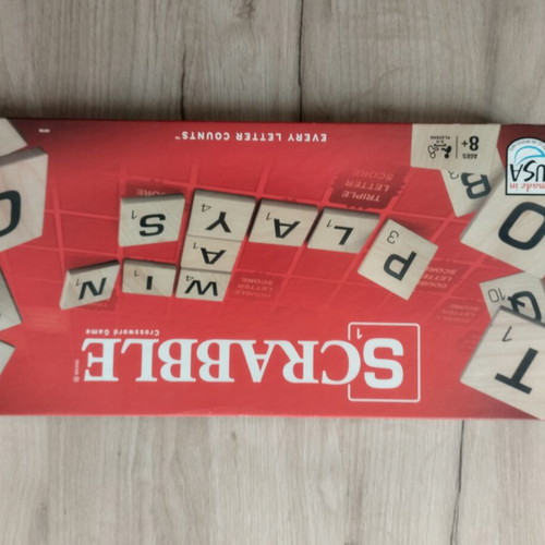 Scrabble board game like new with Latin characters