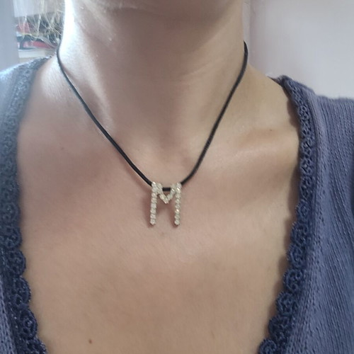 Women's necklace with 'M' monogram and rhinestones