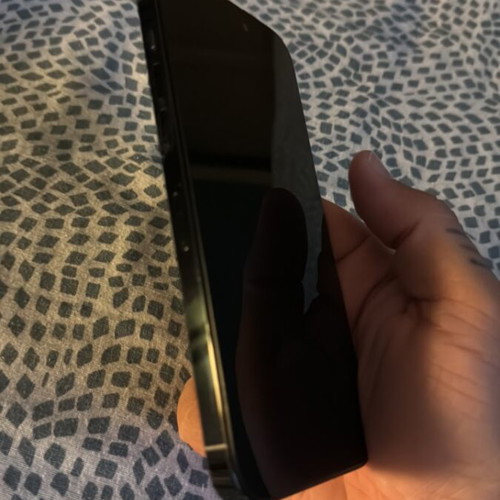 iPhone 14 Pro Max 128GB smartphone with replaced screen and broken back
