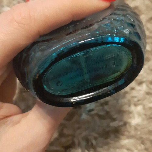 Empty Bentley and Kiton cologne bottles used
