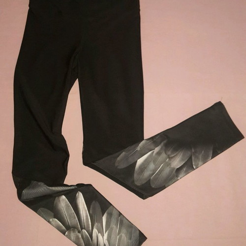 Black women's leggings new with beautiful detail at bottom, X small