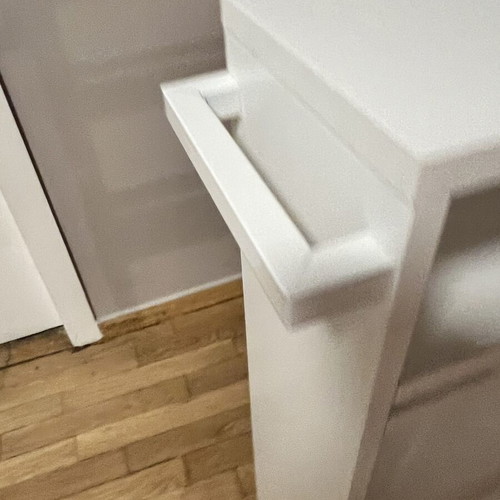 White kitchen shelf unit with adjustable shelf and wheels