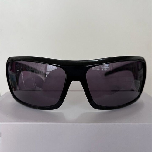 Rebecca Blu women's sunglasses with green lenses