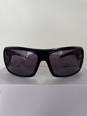 Rebecca Blu women's sunglasses with green lenses