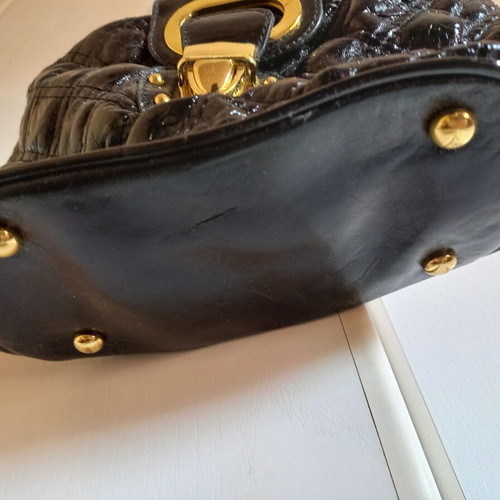 Black shoulder bag new with gold details