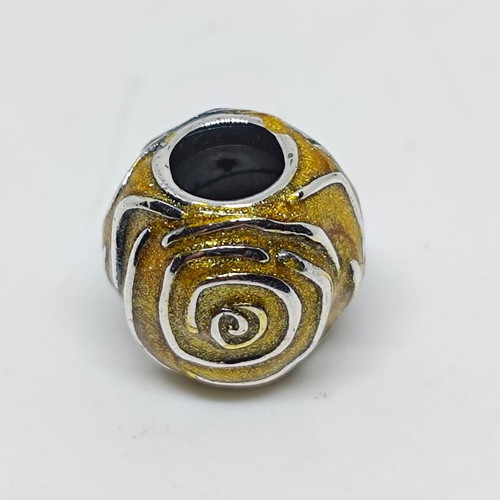 Silver charm bead with gold glitter enamel spiral design like new