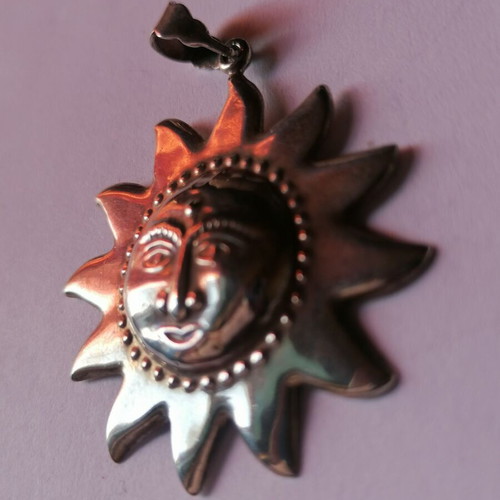 Silver 925 sun pendant new with embossed face