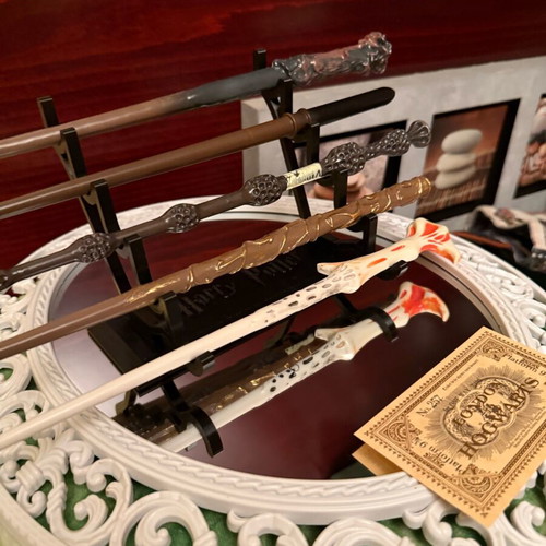 Harry Potter wand set of 5 like new with stand and gilded ticket