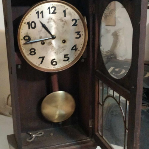 Wall clock pendulum used, wooden, old, with door and winding key