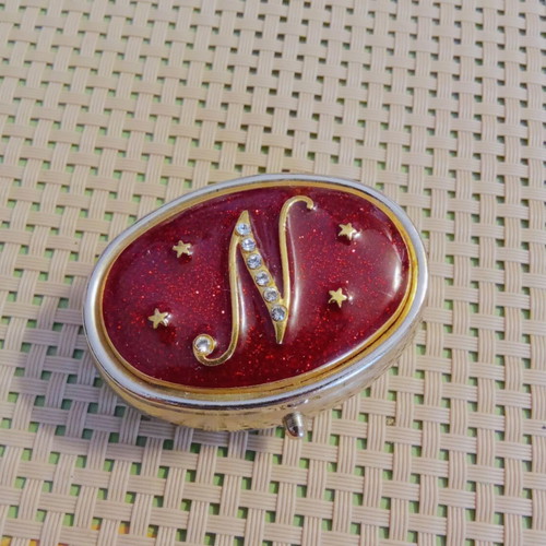Vintage metal pillbox with red enamel and monogram N, like new