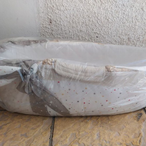 Knitted bassinet like new with mosquito net
