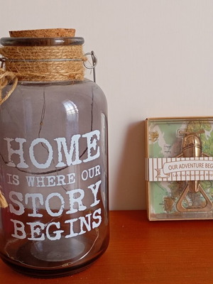 Glass jar with lights and bottle opener