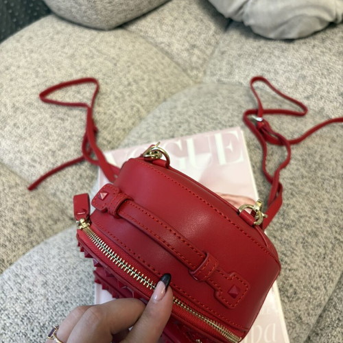 Backpack made of natural leather like new, small red